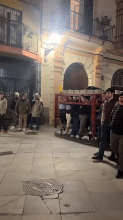 Late night street gatherings and club scenes documented in Sevilla