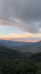 Tourists capture sunrise views at Mount Batur overlooks