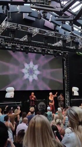 Three performers light up a London stage with vivid LED visuals