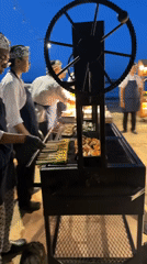 Beach food vendors operate illuminated carts in Denpasar