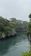 Rainy morning at Jeju's canyon pavilion and suspension bridge