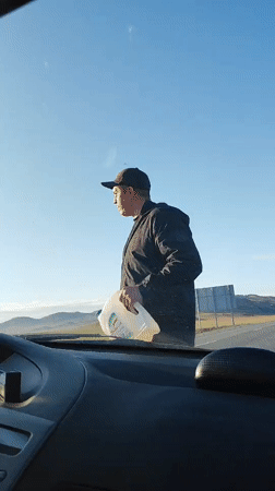 Rural road trip documented through dry countryside landscape