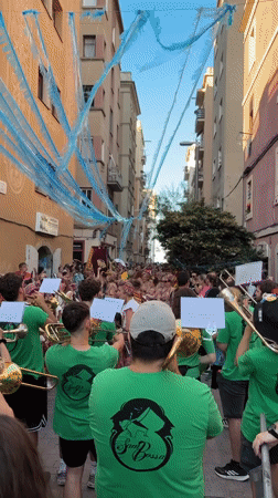 Barcelona street parade and beach scenes documented Sunday afternoon