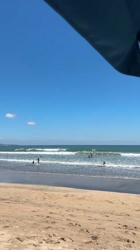 Sunny beach day recorded in Kuta, Indonesia