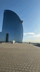 Morning stroll along Barcelona's palm-lined waterfront promenade