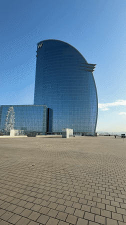 Morning stroll along Barcelona's palm-lined waterfront promenade