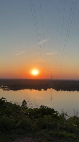 Sunset captured over water near Noviy, Russia