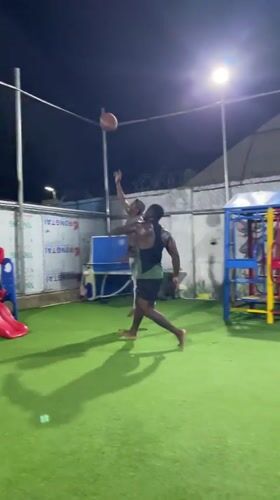 Nighttime basketball game played on artificial turf in Akwanga