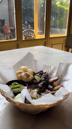 Late-night Balinese satay captured at Kuta restaurant