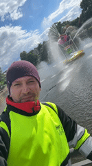Man takes selfie at decorative fountain in Bietigheim-Bissingen