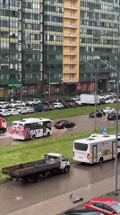Flooded streets and a street race on a rainy Russian city day