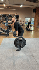 Man performs deadlift at gym in Chaykovsky, Russia