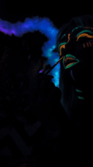Artist Creates Glowing Body Art Under Blacklight in Noviy