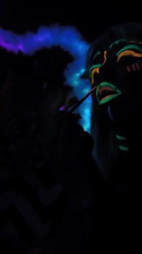 Artist Creates Glowing Body Art Under Blacklight in Noviy