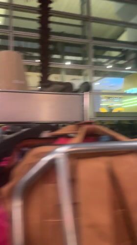 Travelers document routine activities at Kuala Lumpur International Airport
