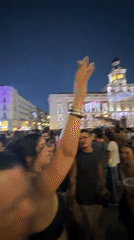 Madrid's Puerta del Sol hosts a packed Pride night event