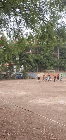 Children play soccer and hopscotch in Cabudare, Venezuela