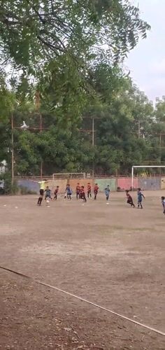 Children play soccer and hopscotch in Cabudare, Venezuela