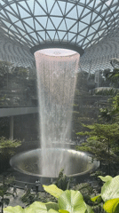 Indoor waterfall filmed in glass-domed Singapore structure