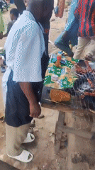 Ordinary street life unfolds in Jos commercial district