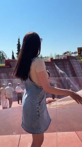 Women pose for photos at Krasnodar fountain plaza