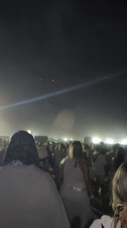 Nighttime outdoor gathering documented in Indio, California