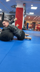 Grappling training session documented at Krasnoyarsk gym
