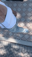 Woman documented on brick patio in Boca Raton evening