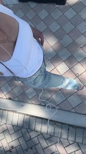 Woman documented on brick patio in Boca Raton evening