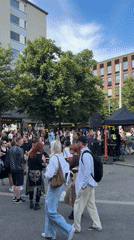 Street event and crowd in central Helsinki, summer afternoon