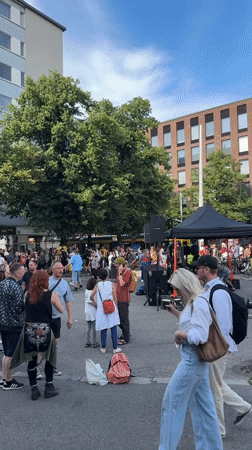 Street event and crowd in central Helsinki, summer afternoon