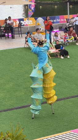 Stilt performers entertain crowds in outdoor Macau show