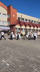 School gathering with dancing couples captured in Zelenogradsk