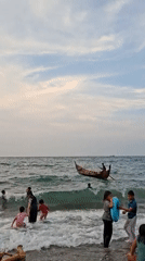 Families enjoy beach day in Lhokseumawe, Indonesia