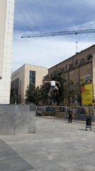 Skateboarder falls attempting jump near Barcelona's La Boqueria market