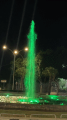 Limassol roundabout fountain cycles through colored lights at night