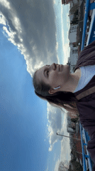 Woman photographed outdoors in Belgrade wearing quilted jacket