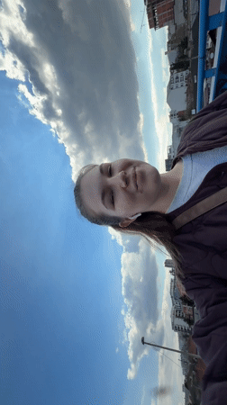 Woman photographed outdoors in Belgrade wearing quilted jacket