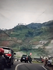 Mountain roads, rice terraces, and Indonesian quote graphics from Tegaldowo