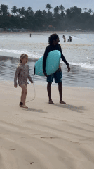 Early morning surf session draws families to Weligama Beach