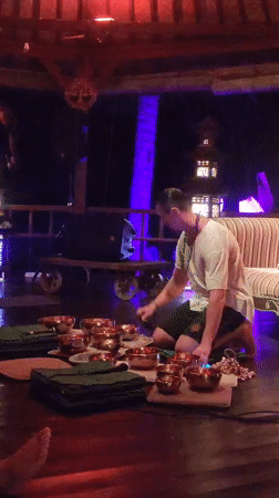 Sound healing session with singing bowls held in Blahbatuh pavilion