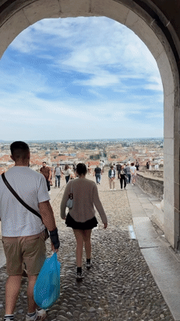Tourists, street performers enliven Bergamo squares on sunny afternoon