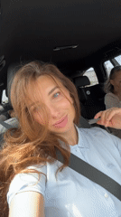 Woman observed in driver's seat wearing seatbelt in Valencia