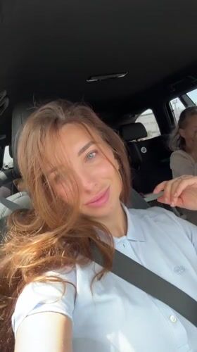 Woman observed in driver's seat wearing seatbelt in Valencia