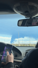 Dark smoke plume spotted from car in Yugo-Kamskiy, Russia