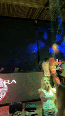 Late-night club scene in Burgas with DJ and dancers