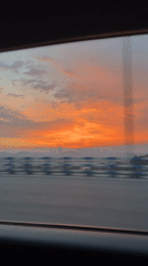 Motorist captures vivid sunset through car window in Nan'an District