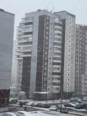 Family moments documented during snowfall in Perm, Russia