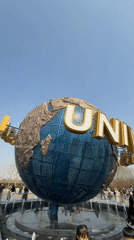 Visitors document Universal Studios globe at Beijing theme park