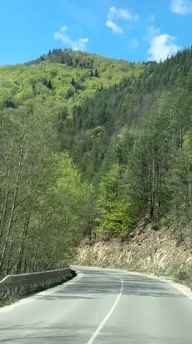 Morning drive captured on winding mountain road in Bulgaria